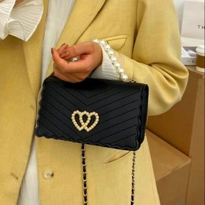 Pearl handle leather messenger bag